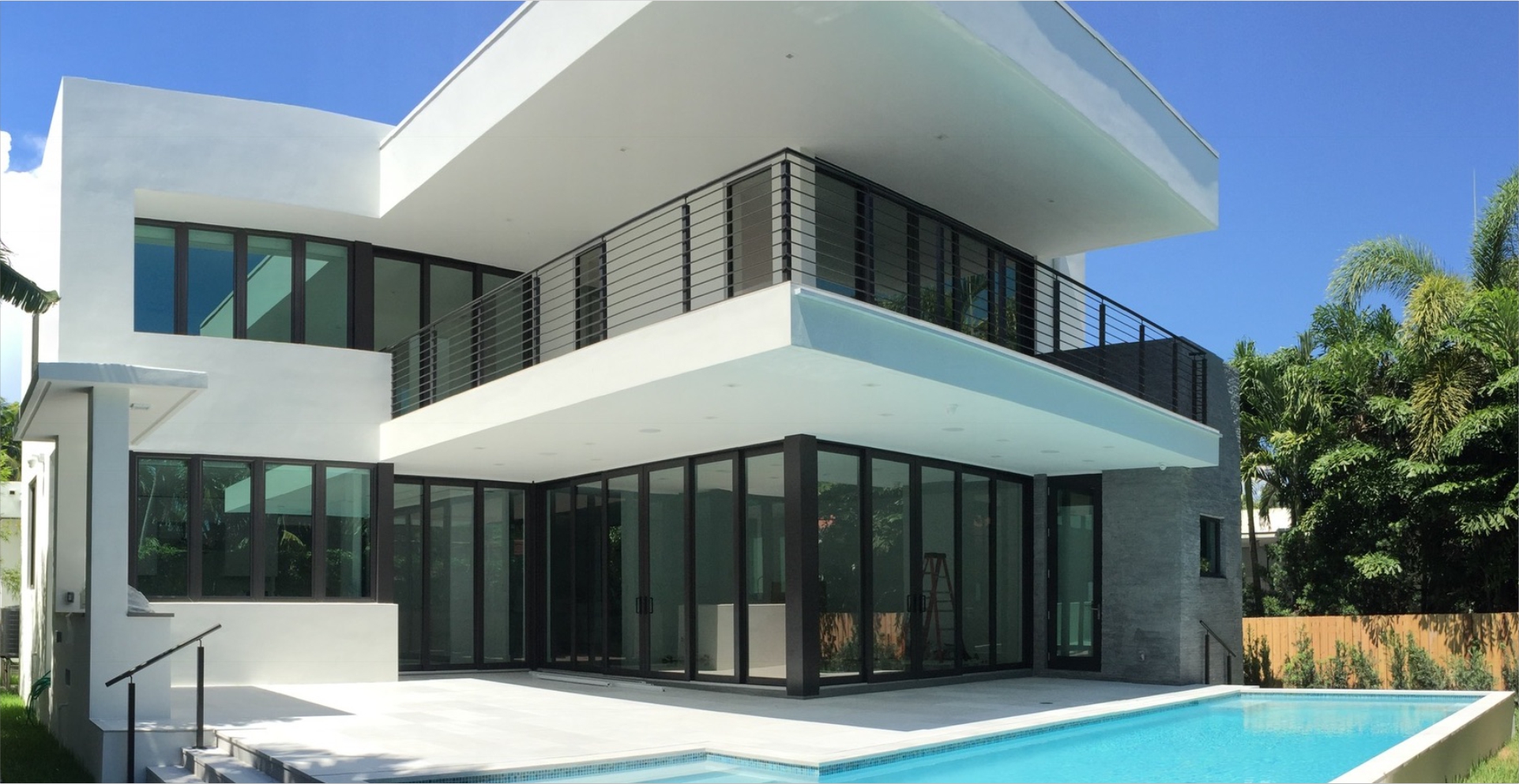 Amazing luxury home in Miami with modern architecture, large windows and a great pool area.